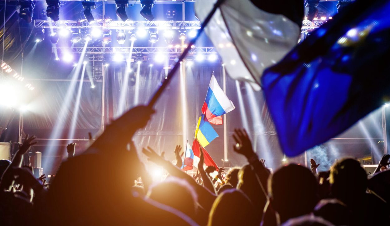Russian flag at the concert, opposite the light from the stage